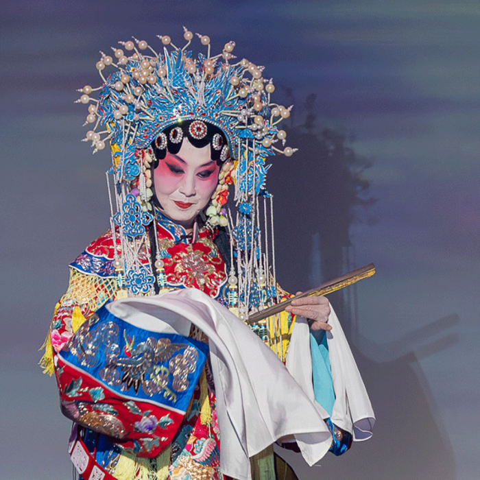 Actor dressed in Asian festive apparel