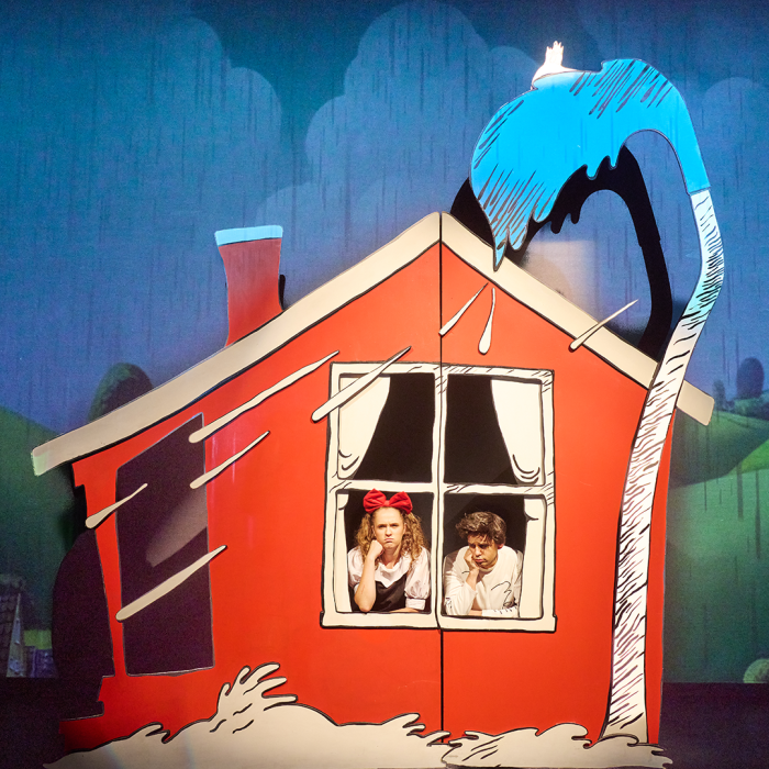 Red House with characters peaking through the window